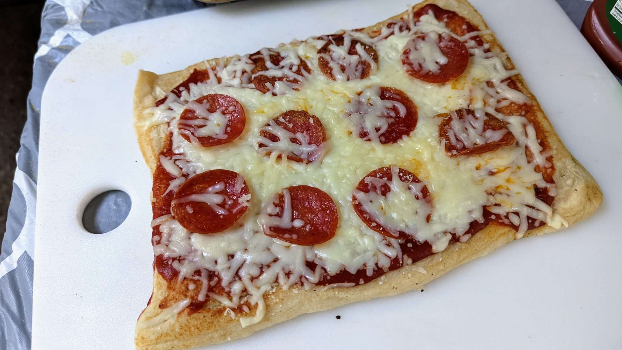 Pepperoni Pizza on the Blackstone Griddle with Pillsbury Crust Rogina